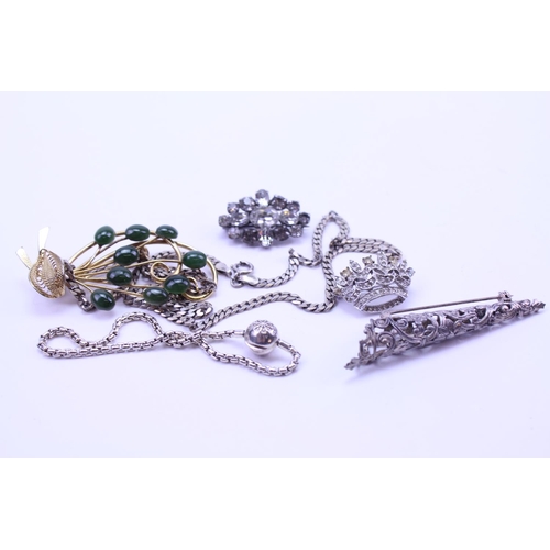 105 - Various costume jewellery to include brooches, Silver items, etc.