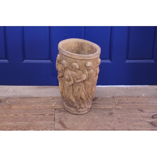 866 - A Concrete Vase Shaped Garden Urn decorated with Classical Figures. Measuring: 47cms High.