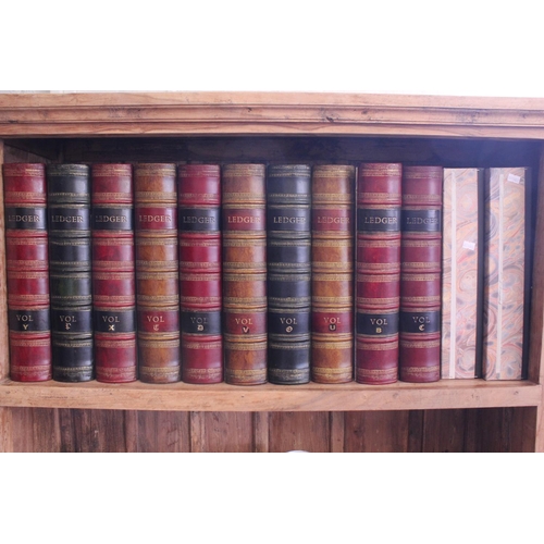 316 - A Collection of 12 Gilt Leather Bound Ledger Folders with Marbled Effect Paper.