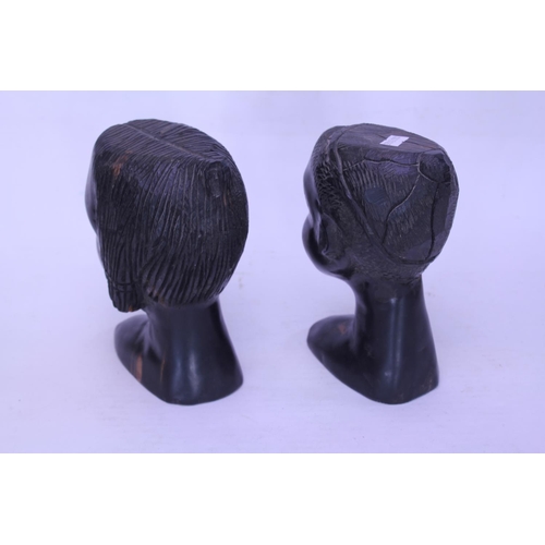 872 - A Pair of carved African Bookends depicting a Native Couple.