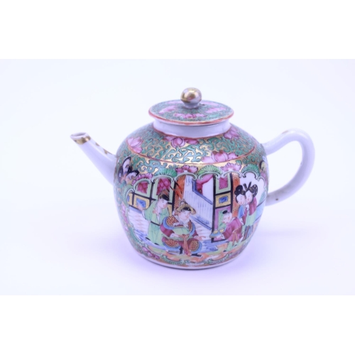 895 - A Chinese Cantonese enamelled Tea Pot decorated with a Tea Ceremony.