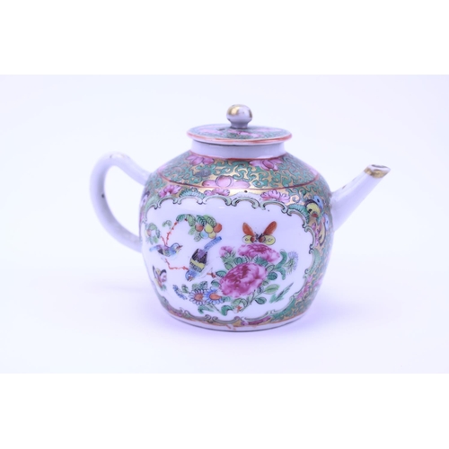 895 - A Chinese Cantonese enamelled Tea Pot decorated with a Tea Ceremony.