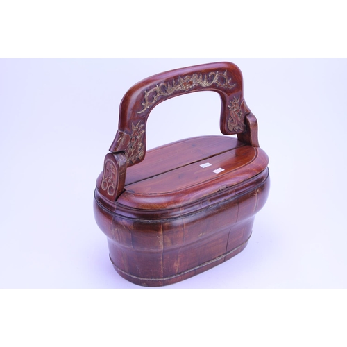 908 - A Chinese Carved Hardwood Food Basket with Carrying Handle.