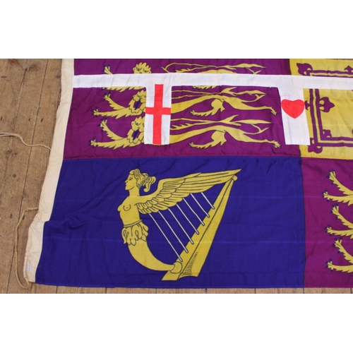 921 - A Hong Kong Standard Flag depicting English Crests hung from Princess Anne's Boat which took her aro... 