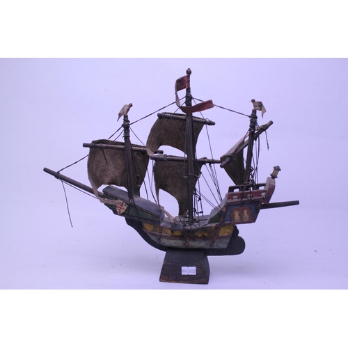 922 - A Scratch built model of a three mast Galleon in various colours.