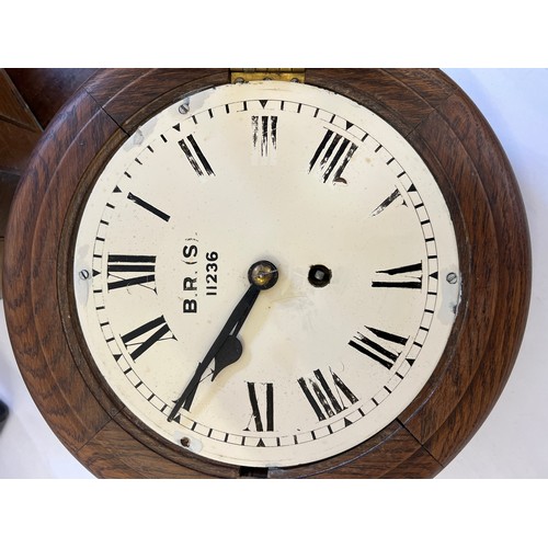 285 - A British Railways B.R.(S) Oak Cased Clock with Brass mechanism, painted dial No: 11236. Measuring: ... 