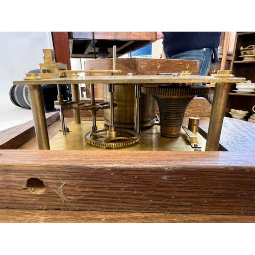 285 - A British Railways B.R.(S) Oak Cased Clock with Brass mechanism, painted dial No: 11236. Measuring: ... 