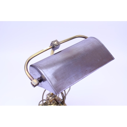 639 - An Antique Students Lamp in Brass with Swing Reflective Shade & Brass Switch.