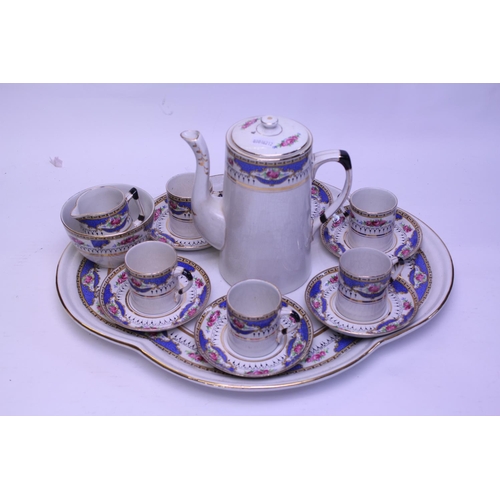 561 - A Staffordshire Powder Blue Floral decorated & Gilt Cabaret Set for 6 People with Tray.