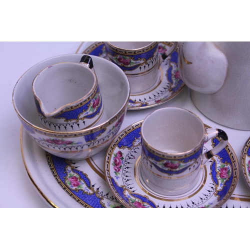 561 - A Staffordshire Powder Blue Floral decorated & Gilt Cabaret Set for 6 People with Tray.