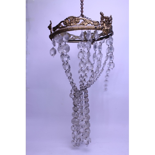 630 - A Brass mounted Bag Shaped Chandelier. Measuring: 26cms across.