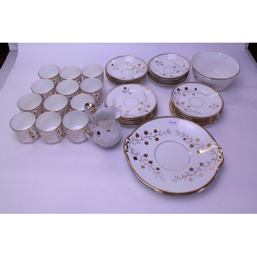 569 - A Gold Decorated Late 19th Century Tea Set for 12 Persons to include 2 x Sandwich Plates, Jug, Slop ... 