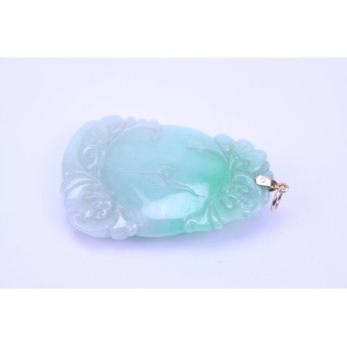 120 - A Chinese Green Jade Gold Mounted Pendent designed as a Linzi Fruit.