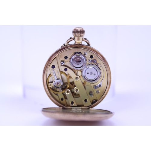 123 - A Small 18ct Gold Pocket Watch with an 18ct Gold Bi-Metal Albert Chain & a 1900 