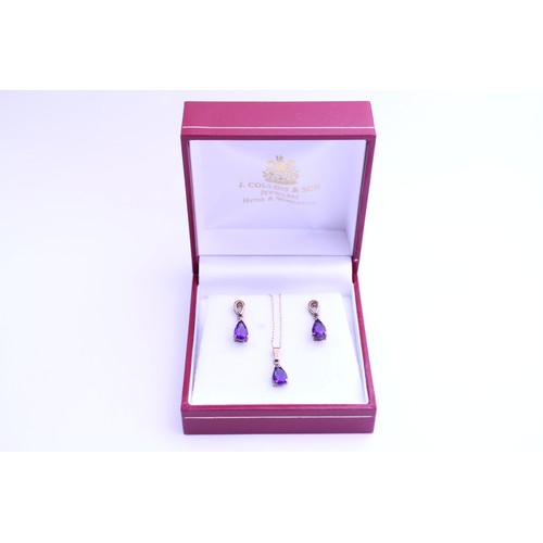 122D - A Pair of Amethyst Coloured Stones in Earrings along with a Matching 9ct Gold Chain & Pendent.