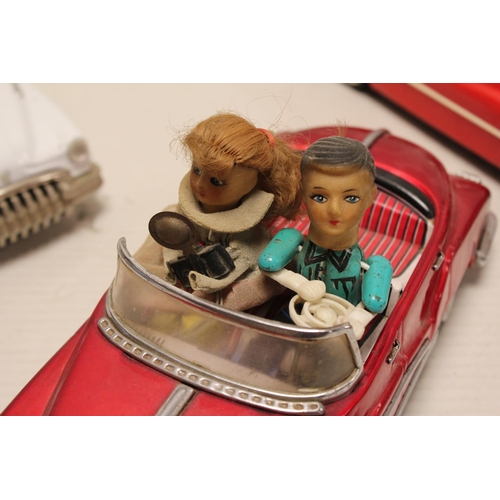 321 - A Scarce Tin Plate Car in Red Metallic with Two People along with Two Minister Cars as Found.