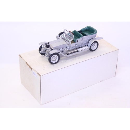 158 - A Franklin Mint 1907 Rolls Royce Silver Ghost finished in Silver. The model appears Mint & comes in ... 