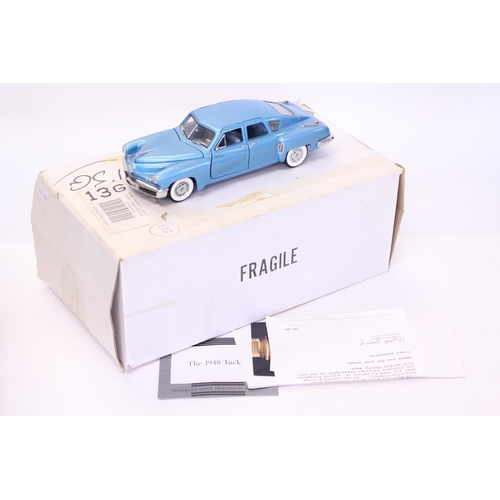 161 - A Franklin Mint 1948 Tucker finished in Light Blue Metallic. The models appears to be in Mint Condit... 