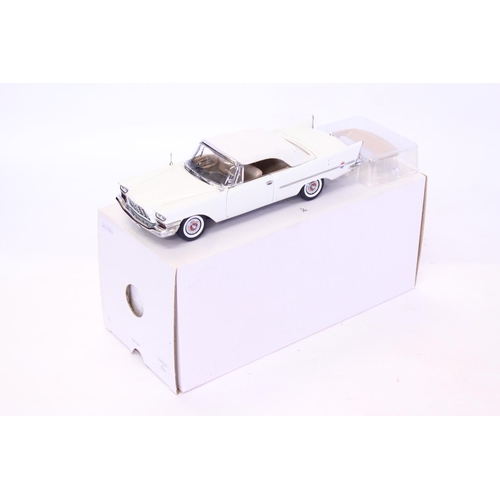 163 - A Danbury Mint 1957 Chrysler 300C Convertible finished in White. The model appears to be in Mint Con... 