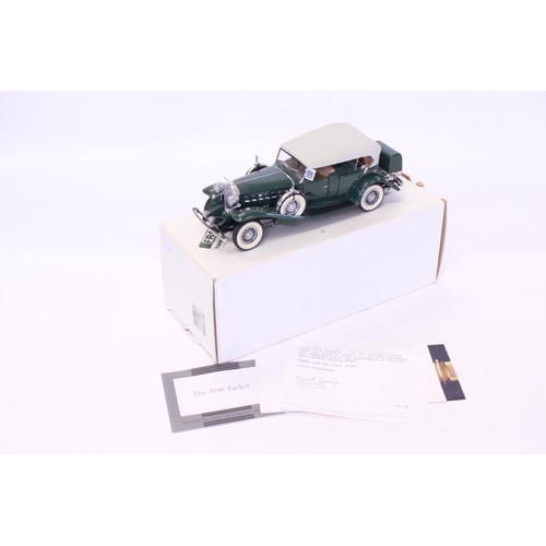 164 - A Danbury Mint 1932 Cadillac V16 Sport Phaeton finished in Green. The model appears to be Mint apart... 