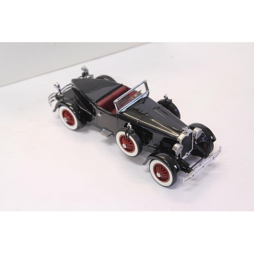 165 - A Danbury Mint 1927 Stutz Black Hawk finished in Black. The model appears to be in Mint condition & ... 