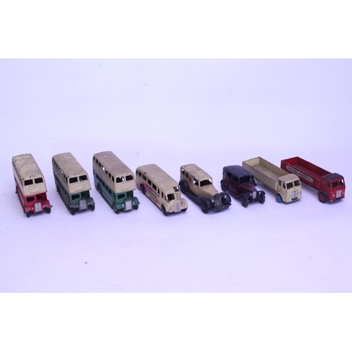 75 - A Collection of 8 x 1940s/1950s Dinky Toys to include 4 x Buses, Ambulance, Taxi, 2 x Forward Contro... 