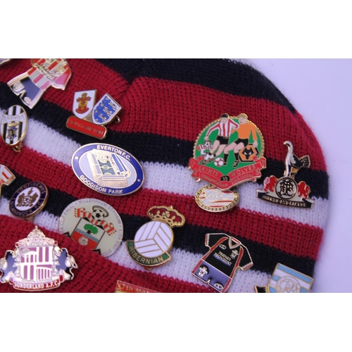 555 - A Southampton Football Club Original Woollen Hat with over 45 Original Lapel Badges from many Footba... 