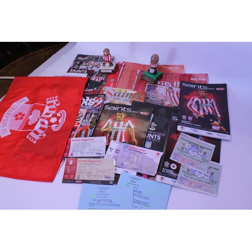 556 - A Southampton Football Club quantity of Home Programmes, Several Seasons & Tickets along with a Flag... 