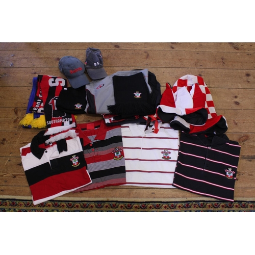 560 - A Southampton Football Club to include 4 x Scarfs, 4x Assorted Hats, 2 x Rosettes, a Sweat Top, 4 Go... 