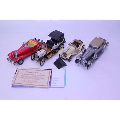 137 - A Collection of 4 x Franklin Mint models to include a 1912 Packard Victoria, Mercedes 500K, Duesenbe... 