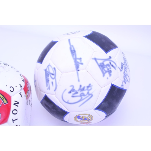 572 - A Southampton Football Club Signed Football along with a Real Madrid Signed Football.