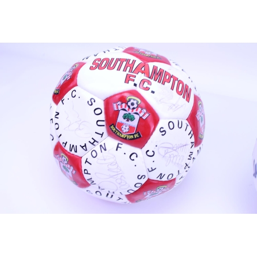 572 - A Southampton Football Club Signed Football along with a Real Madrid Signed Football.