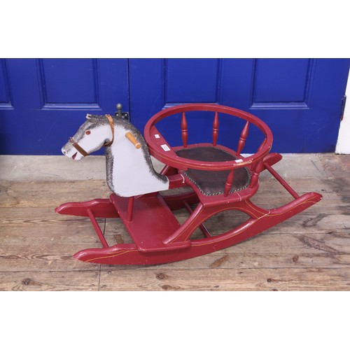 500 - A Red Painted Childs Rocking Horse with Seat, turned supports & painted in Red, Black & Cream.