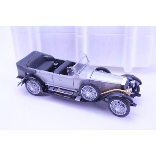 148 - A Franklin Mint 1926 Rolls Royce Silver Ghost in Silver & Black. The model appears to be Mint apart ... 