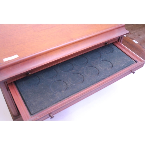 629 - A Modern 7 Drawers Mahogany Effect Coin/ Cabinet/Medals. Measuring: 52cms across x 38cms deep x 29cm... 