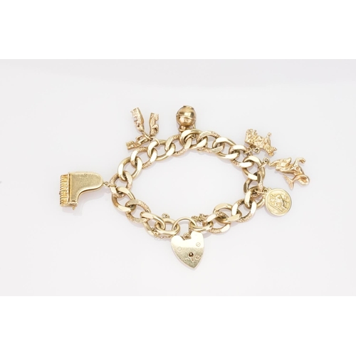 238 - A 9ct Gold Charm Set Bracelet mounted with Six Charms. Weighing: 67.5 grams.