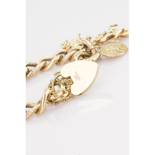 238 - A 9ct Gold Charm Set Bracelet mounted with Six Charms. Weighing: 67.5 grams.