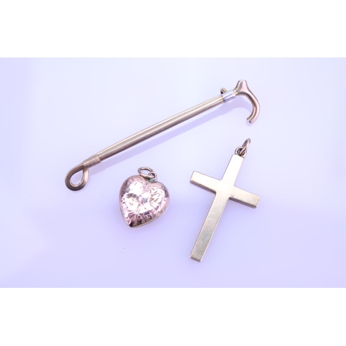 234 - A 9ct Gold Walking Stick Brooch along with a 9ct Gold Cross and Pendant. Total weight: approx 9.3g.