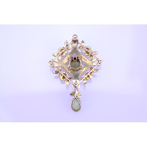 237 - A Beautiful 15ct Gold peridot and pearl brooch with teardrop peridot, fitted with pendant fitting, d... 