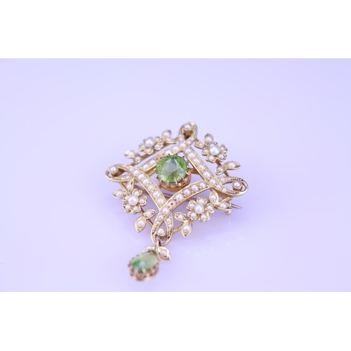 237 - A Beautiful 15ct Gold peridot and pearl brooch with teardrop peridot, fitted with pendant fitting, d... 