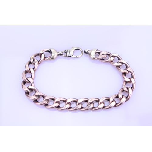 255 - A Gentleman's Rose and yellow Gold curb bracelet (hallmark is rubbed), length approximately 22.5cm, ... 