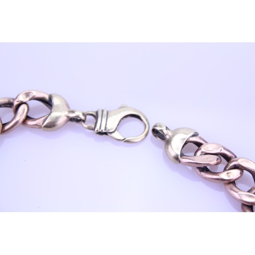 255 - A Gentleman's Rose and yellow Gold curb bracelet (hallmark is rubbed), length approximately 22.5cm, ... 