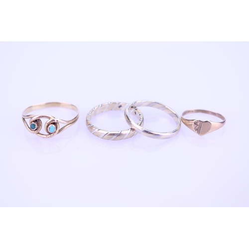 262 - A collection of four 9ct Gold rings including a wedding band set, a turquoise ring along with a chil... 