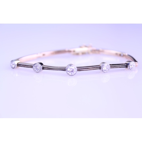 245 - A 15ct Gold Diamond bracelet converted from a watch strap, set with 5 diamonds. Largest Diamond appr... 