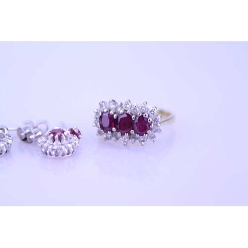 247 - An 18ct Gold Ruby and Diamond set Ring along with a similar pair of Ruby and Diamond earrings. Total... 