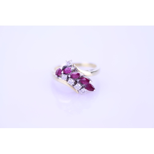 248 - An 18ct Gold Diamond and Ruby set Ring. Size approx: N. Weight approximately 5.4 grams.