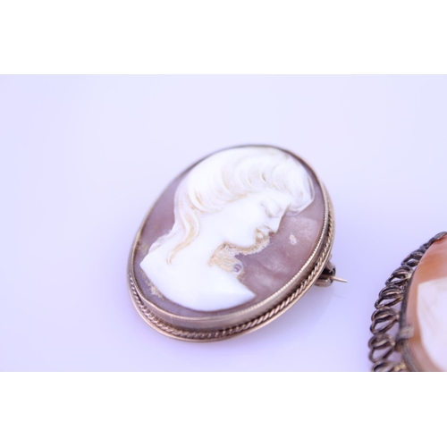 252 - A 9ct Gold cameo of a young lady along with one other larger cameo. Size of small cameo approx. 3.5c... 