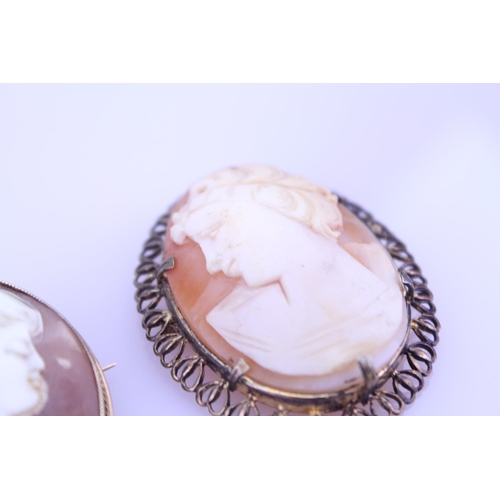 252 - A 9ct Gold cameo of a young lady along with one other larger cameo. Size of small cameo approx. 3.5c... 