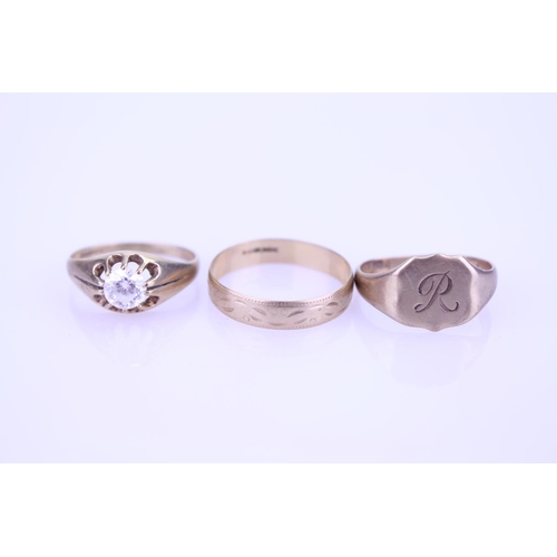 253 - Three 9ct Gold Rings, one set with a paste stone. Total weight approximately 7g.