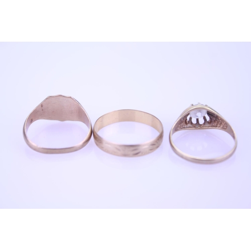 253 - Three 9ct Gold Rings, one set with a paste stone. Total weight approximately 7g.